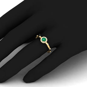 Maurya Mountain Emerald Engagement Ring with Diamond Halo