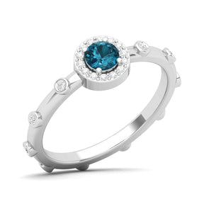 Maurya Mountain Emerald Engagement Ring with Diamond Halo