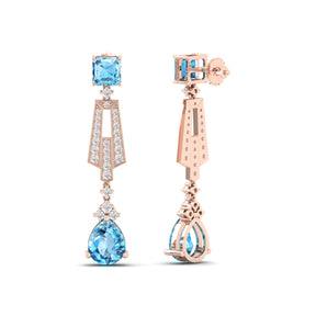 Maurya Blue Topaz Pendulum Drop Earrings with Diamonds