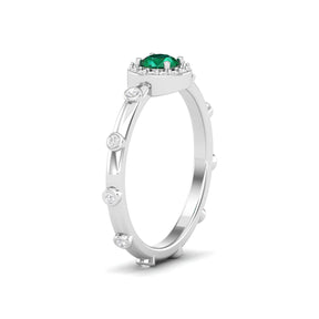 Maurya Mountain Emerald Engagement Ring with Diamond Halo