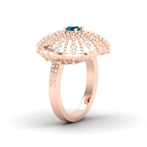 Maurya Desert London Blue Topaz Cocktail Ring with Scattered Diamonds