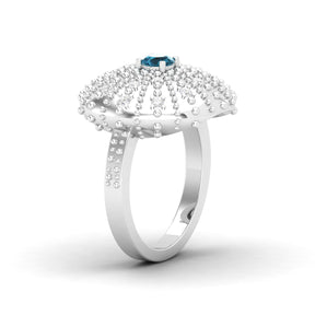 Maurya Desert London Blue Topaz Cocktail Ring with Scattered Diamonds