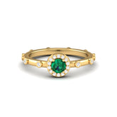 Maurya Mountain Emerald Engagement Ring with Diamond Halo